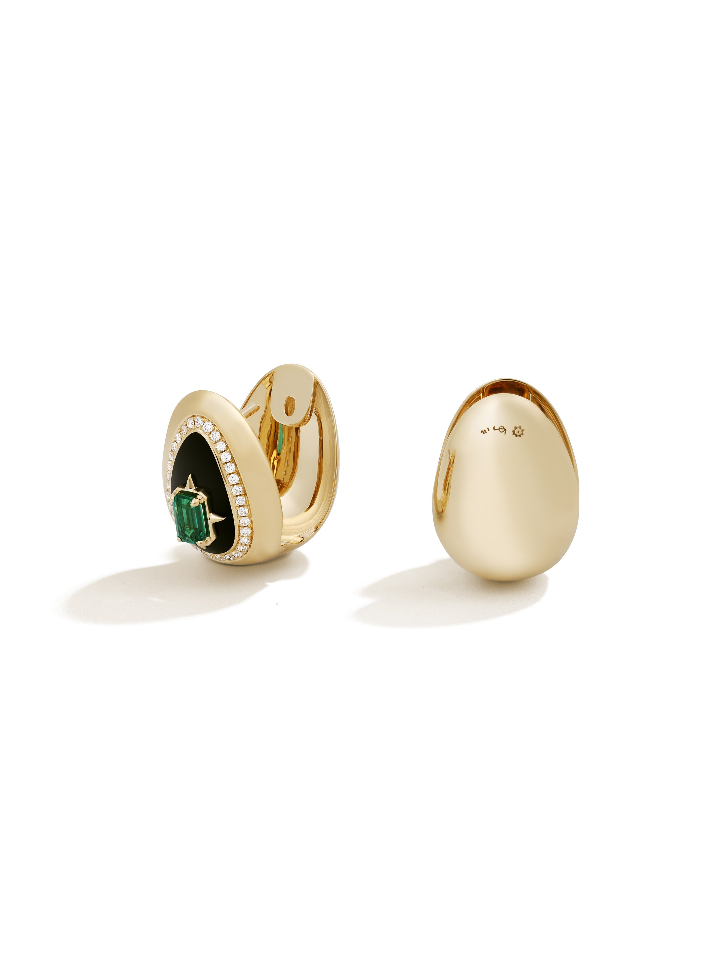 Cosmic Egg Enchantress Earrings in 18K yellow gold, centre emerald and jet black enamel, additional view, State Property Story of Everything collection