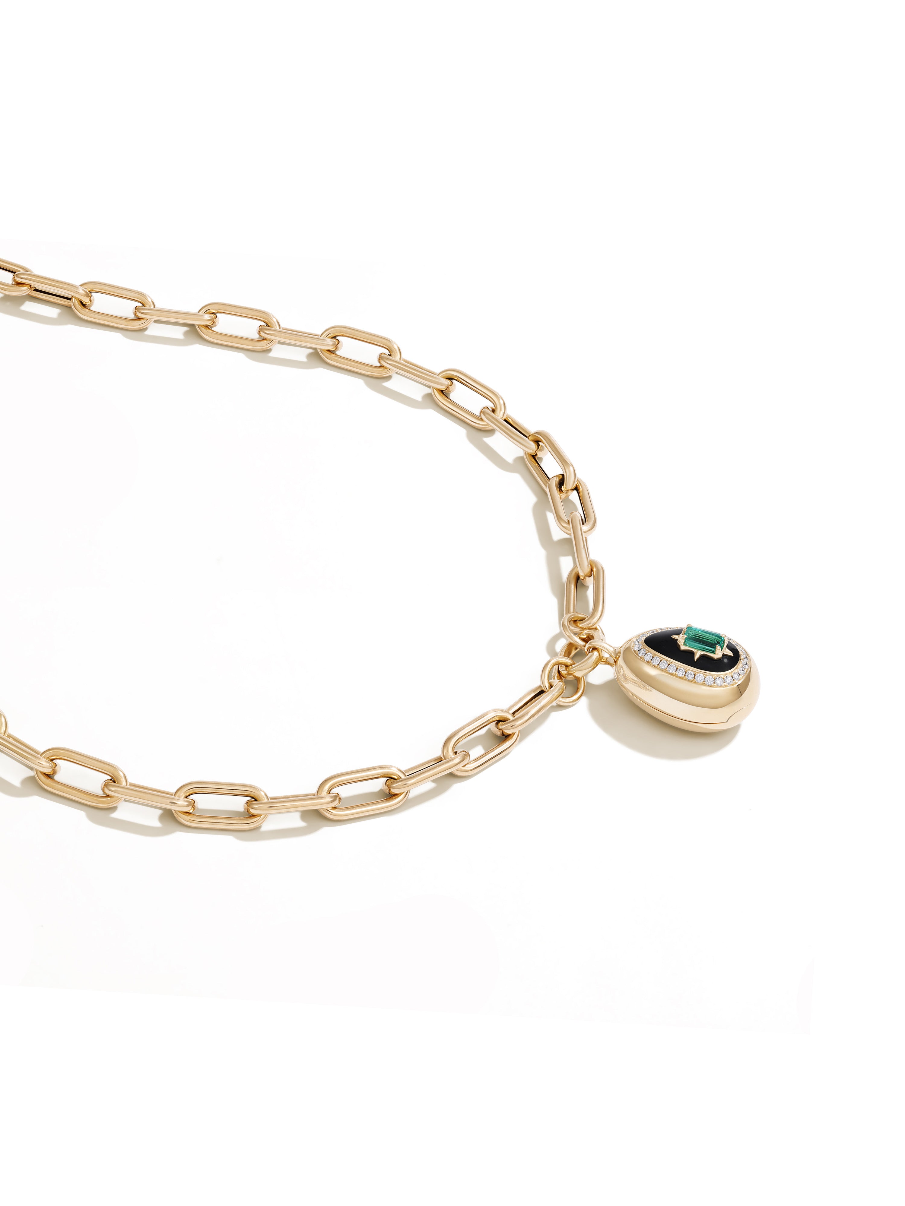 Cosmic Egg Enchantress Locket Pendant in 18K yellow gold, emerald-cut emerald on a paperclip chain, additional view, State Property Story of Everything collection
